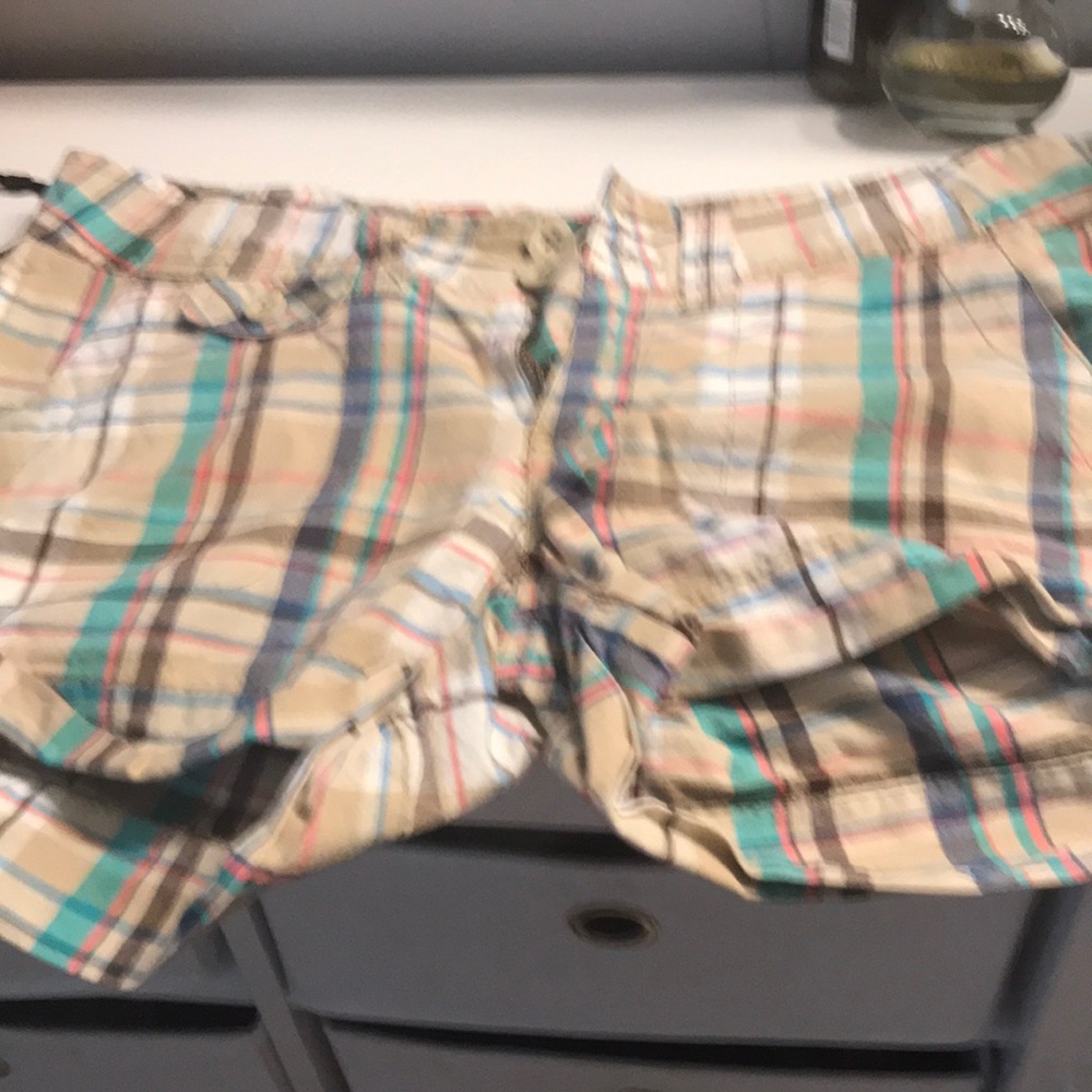 Plaid shorts.